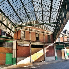Lost Smithfield and its derelcit market buildings. London walking tours with Paul Talling routes of lost rivers/canals/docks 