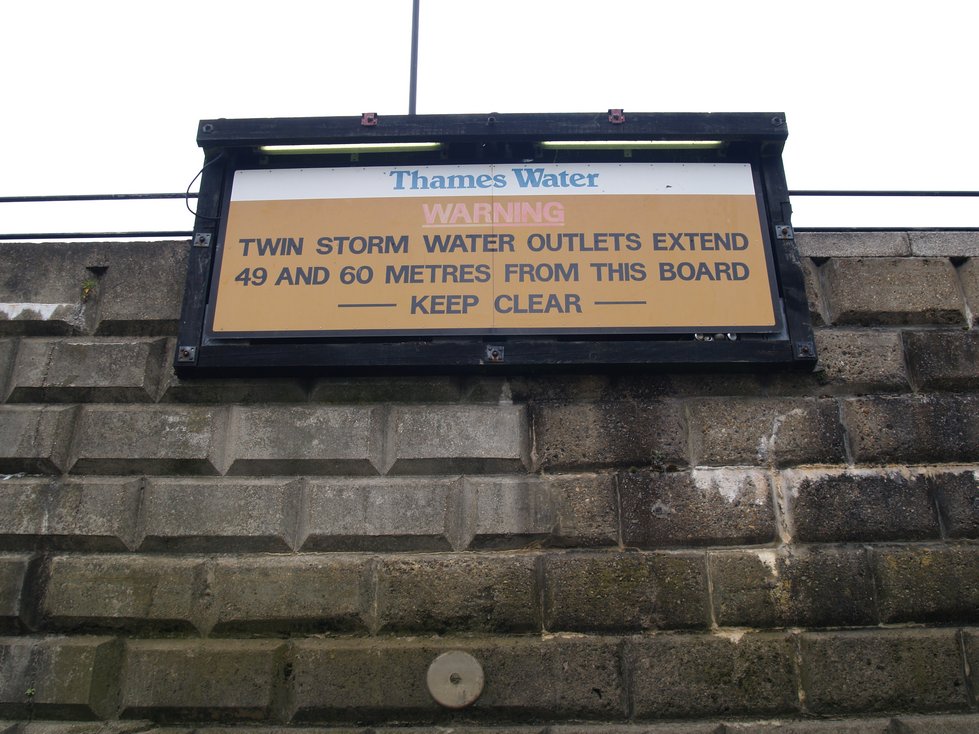 Parr's Ditch. Warnings along the Thames in Hammersmith of  sewer outfalls
