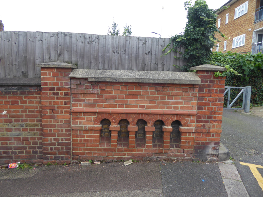Picture of Former bridge parapet over the culverted Moselle  in Wood Green