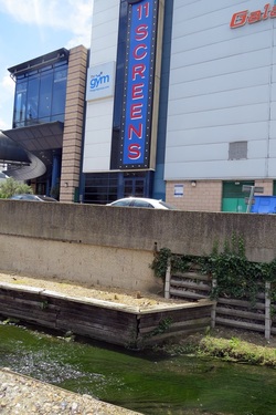 The River Lea briefly reappears beside the Cinema in Luton