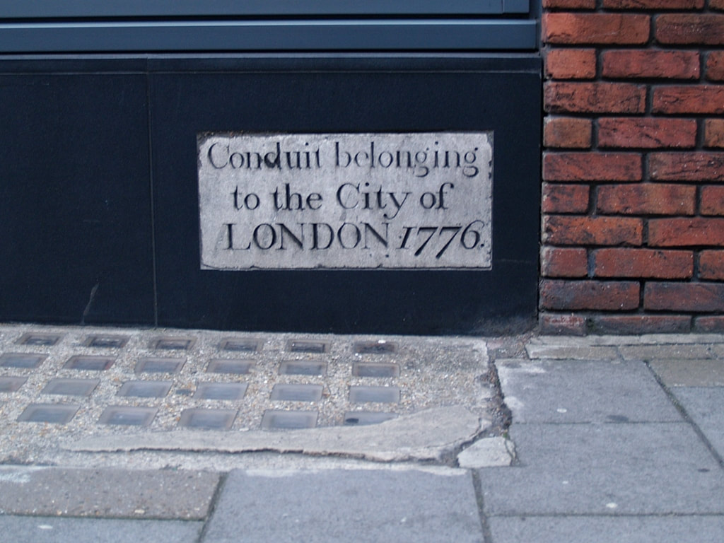 Tablet on the route of the River Tyburn Wigmore Street and Marylebone Lane junction saying that conduit belonging to the City of London 1776